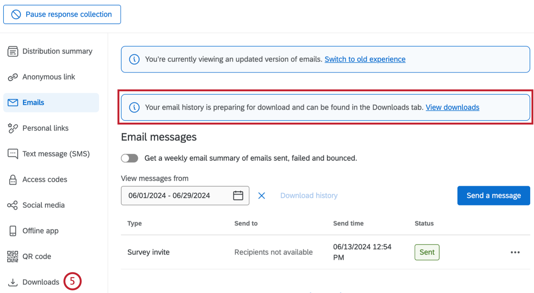 banner saying a distribution history download is in progress, at the top of the emails tab
